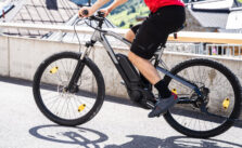 Man Riding E Bike Bicycle In City