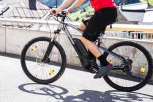 Man Riding E Bike Bicycle In City